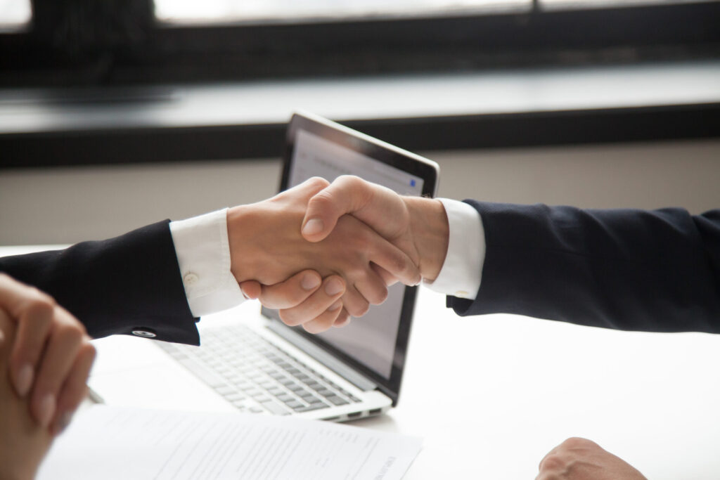 Business handshake representing global partnership
